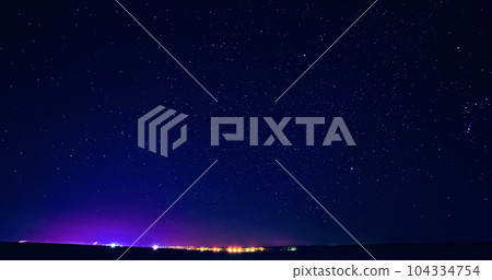 Night Dark Blue Sky Glowing Stars Background Backdrop With Sky Gradient. Colourful Night Starry Sky In Blue Colors. Amazing Night View Sky Above Village Night Dark Blue Sky Glowing Stars Background Backdrop With Sky Gradient. Colourful Night Starry Sky In Blue Colors. Amazing Night View Sky Above Village 104334754