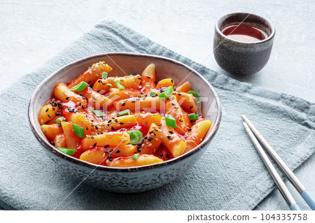 Tteokbokki or topokki, Korean street food, spicy rice cakes 104335758