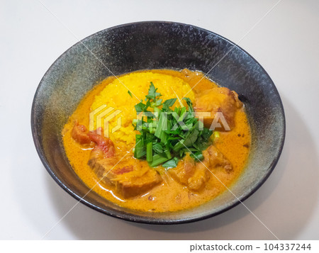 Pork mappas curry on white background Pork mappas curry on white background 104337244