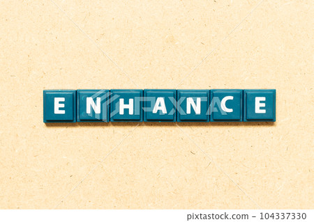 Tile alphabet letter in word enhance on wood background 104337330