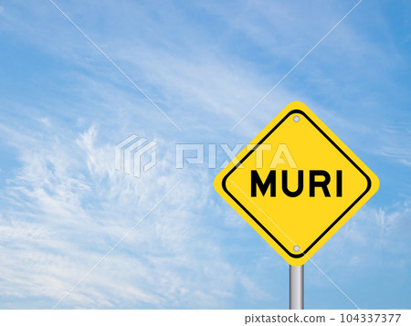 Yellow transportation sign with word muri on blue color sky background 104337377