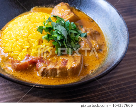 Pork mappas curry up on wood table Pork mappas curry up on wood table 104337609