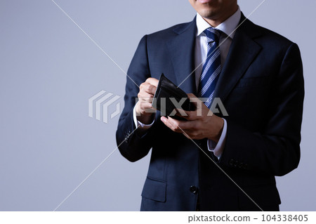 short of money male businessman 104338405