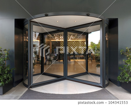 Automatic modern black rotating doors office mockup Automatic modern black rotating doors office mockup 104341553