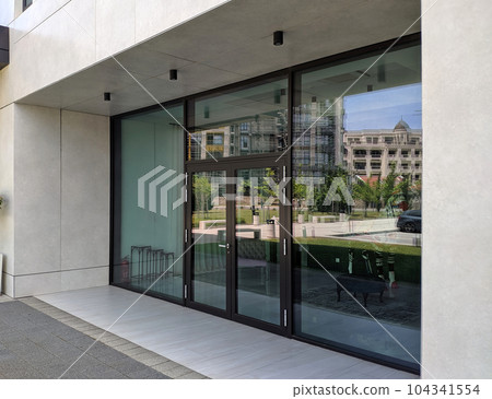 Glass partition mockup and modern doors in hall Glass partition mockup and modern doors in hall 104341554
