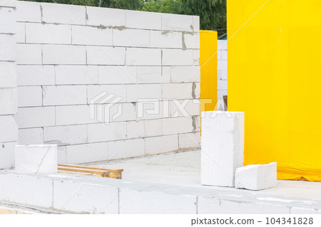 Construction site from a gas block on a concrete floor. 104341828