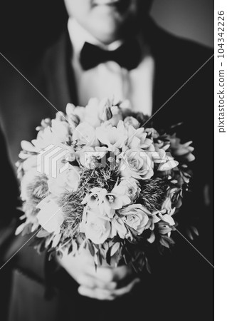 Beautiful wedding bouquet with different flowers, roses 104342226