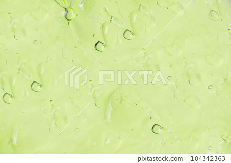 Texture gels Aloe Vera closeup. Green gel macro. Skincare, health care concept Texture gels Aloe Vera closeup. Green gel macro. Skincare, health care concept 104342363