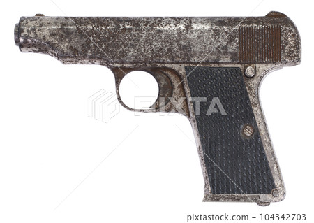 Old vintage rusty pistol 104342703