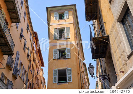 Old Town of Nice city in France, narrow apartment building with shuttered windows n historical district Vieille Ville 104342770