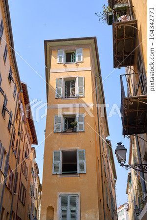 Old Town of Nice city in France, narrow apartment building with shuttered windows n historical district Vieille Ville 104342771