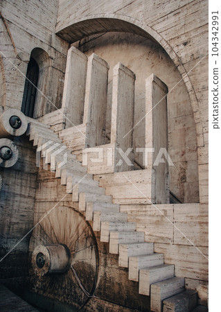 Carved steps staircase side view in modern architecture concept photo. Carved steps staircase side view in modern architecture concept photo. 104342991