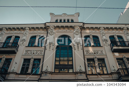 Morning Kharkiv city center building with panoramic windows photo. 104343094