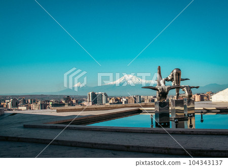 Cityscape with mountain view in the morning time concept photo. Yerevan, capital of Armenia Cityscape with mountain view in the morning time concept photo. Yerevan, capital of Armenia 104343137