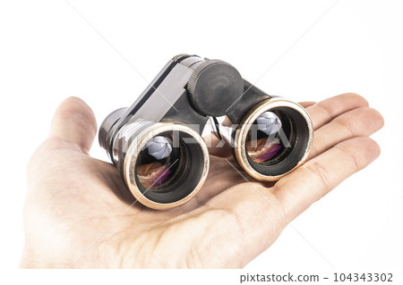 theatrical opera binoculars on a white background isolated theatrical opera binoculars on a white background isolated 104343302