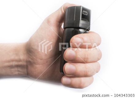 Hand with bottle of pepper spray in eyes, isolated on white background Hand with bottle of pepper spray in eyes, isolated on white background 104343303