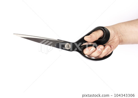 hand with black scissors in white background isolate hand with black scissors in white background isolate 104343306