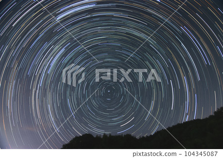 Star trail in the northern sky Star trail in the northern sky 104345087