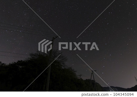 Autumn Starscape: The rising Big Dipper, the setting Cassiopeia 104345094