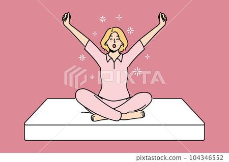 Woman sits on soft mattress and yawns getting ready for healthy sleep furniture concept 104346552