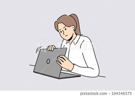 Woman is worried about privacy of data on internet and hides laptop screen while entering password 104346575