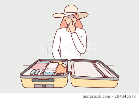 Woman tourist with travel suitcase is worried about losing personal belongings or stealing money 104346578