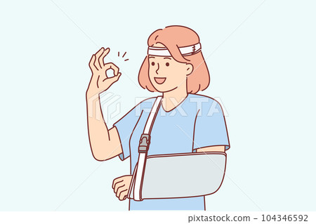 Woman with soft splint on injured arm shows OK gesture rejoices at availability of medical insurance Woman with soft splint on injured arm shows OK gesture rejoices at availability of medical insurance 104346592