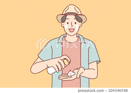 Man with sunscreen stands in beach wear during summer trip to tropical island with hot climates Man with sunscreen stands in beach wear during summer trip to tropical island with hot climates 104346596