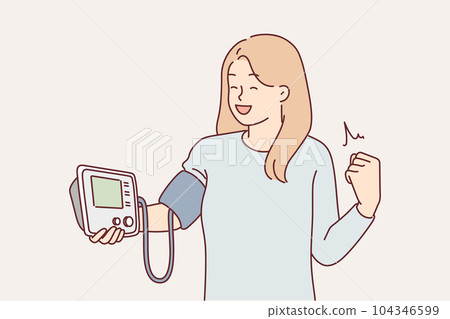 Woman with blood pressure monitor rejoices to see normalization of pulse and getting rid of disease 104346599