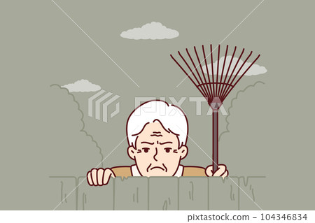 Elderly envious man neighbor peeps from behind fence spying on residents of private house Elderly envious man neighbor peeps from behind fence spying on residents of private house 104346834