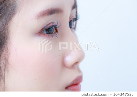 Young woman's face | close-up Young woman's face | close-up 104347583