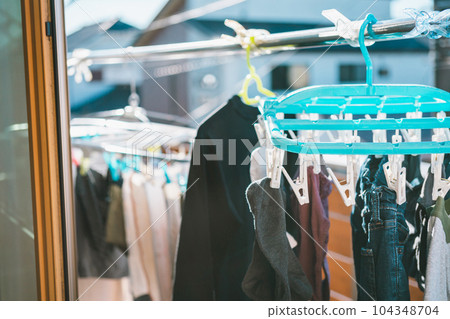 Laundry dried on the veranda 104348704