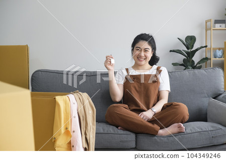 Woman owner buy purchase home, relocate to dwelling, rental, rent, ownership concept Woman owner buy purchase home, relocate to dwelling, rental, rent, ownership concept 104349246