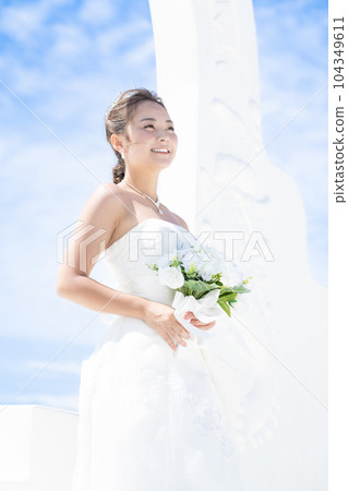 Bride smiling in a wedding dress Pre-shoot 104349611