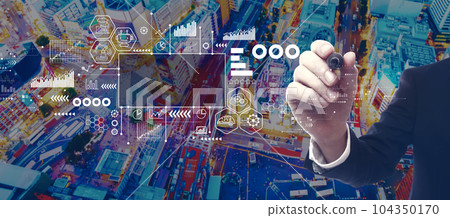 Industry 4.0 theme with businessman in city at night Industry 4.0 theme with businessman in city at night 104350170