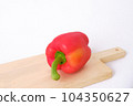 Red paprika on a cutting board 104350627