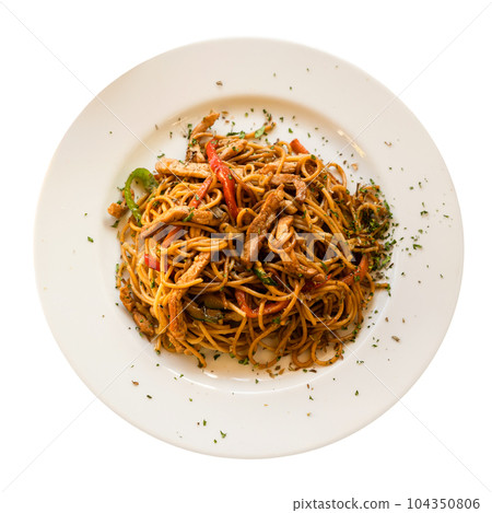 Chinese fried beef noodles served on platter 104350806