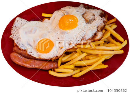 Grilled sausages garnished with scrambled eggs fried with potatoes Grilled sausages garnished with scrambled eggs fried with potatoes 104350862