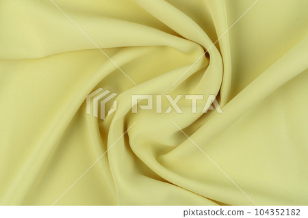 Yellow color fabric cloth polyester texture and textile background. Yellow color fabric cloth polyester texture and textile background. 104352182