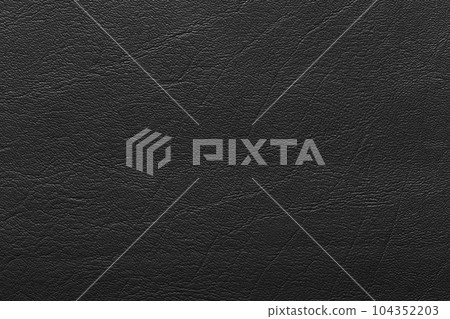 Black leather and a textured background. Black leather and a textured background. 104352203