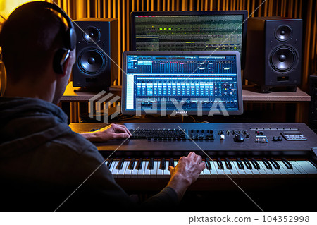 Creative Soundscapes Electronic Music Production in Home Studio and Professional Recording Environment. created with Generative AI 104352998