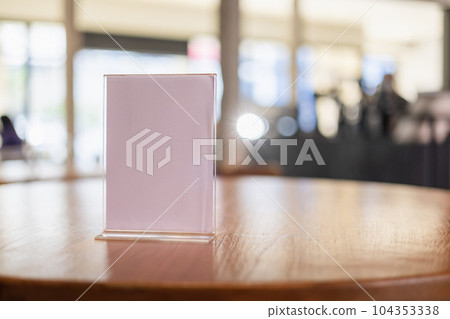 Stand Mock up Menu frame tent card blurred background design key visual layout in cafe 104353338