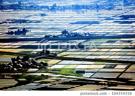 Tadami Line Train running through the Aizu Basin seen from Futanuma Forest Park (Aizumisato Town, Fukushima Prefecture, early morning in late May) 104354356