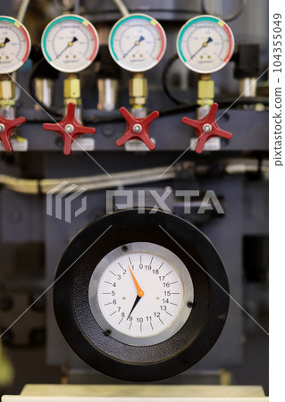 industrial hydraulic equipment with gauges 104355049