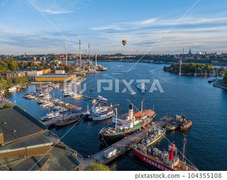 View of amusement park Grona Lund with carousels and tour rides on Djurgarden island Stockholm Sweden 104355108