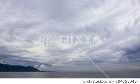 Suspicious clouds flowing in the morning sky of the Seto Inland Sea Suspicious clouds flowing in the morning sky of the Seto Inland Sea 104355349