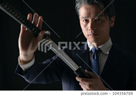 一個拿著劍的男人商人 104356789