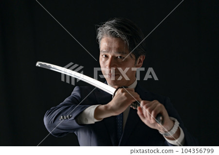 一個拿著劍的男人商人 104356799