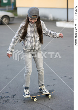 studying skateboard tricks 104356970