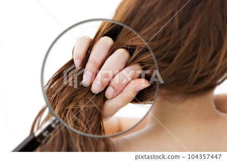 Damaged hair 104357447